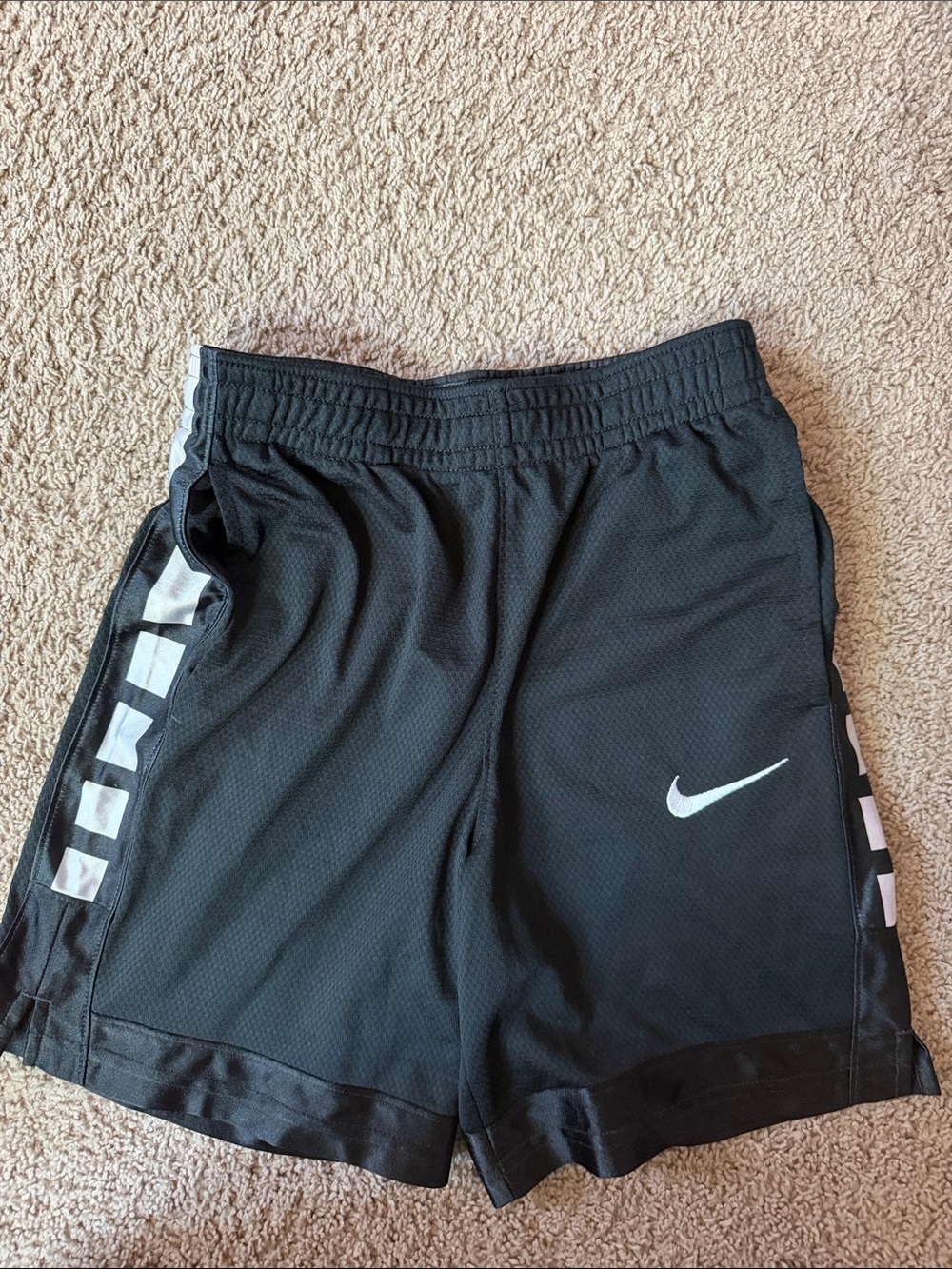 Nike Black Athletic Shorts with White Swoosh and Side Accents